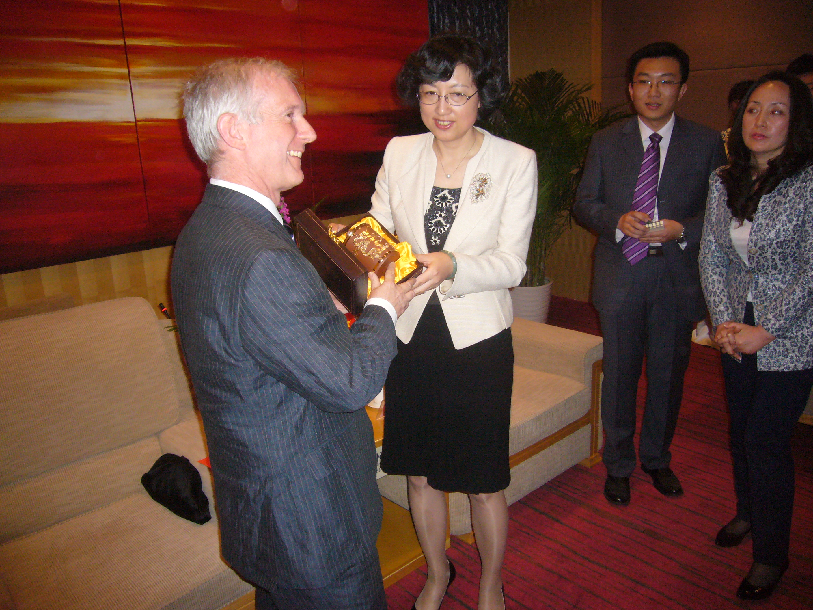 Andrew North receiving a gift from Weihai official - April 2012