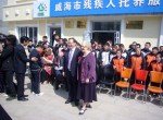 Mayor and Andrew North with Weihai children - April 2012