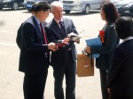 Andrew North with Weihai official - April 2012