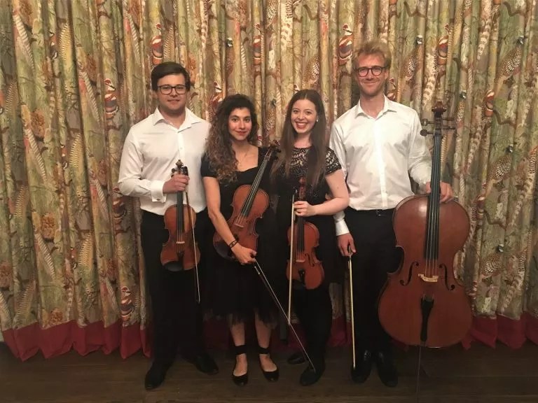 The Kandour String Quartet with their instruments