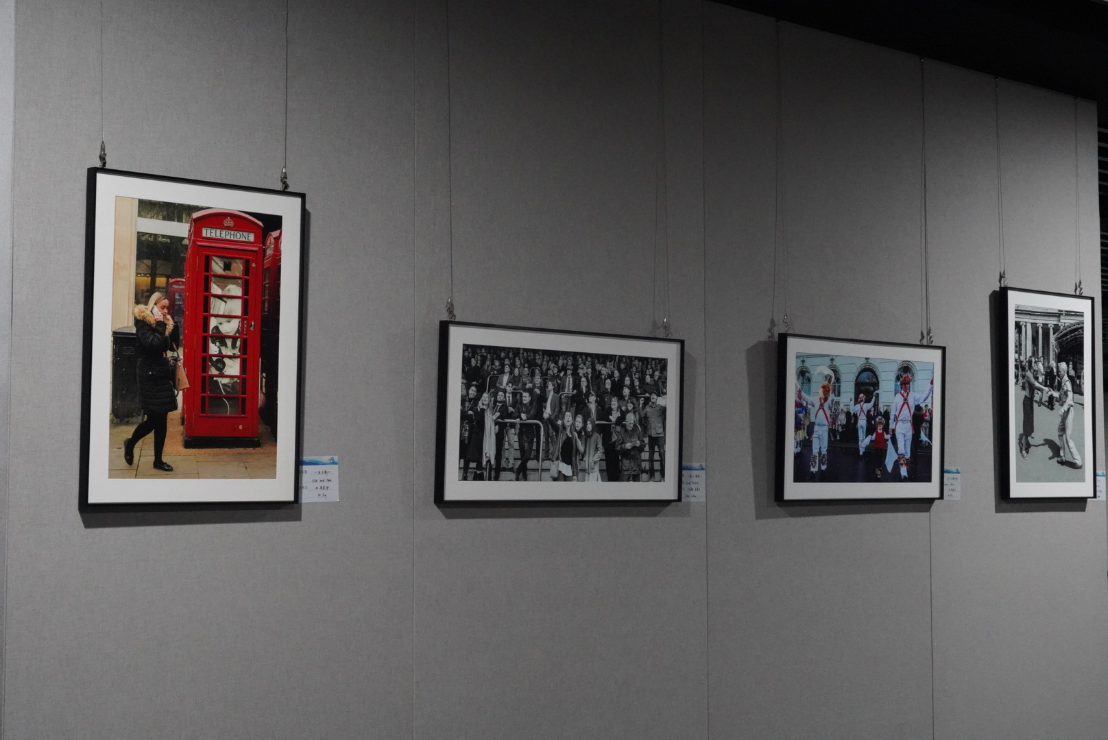 Row of photos at the exhibtion in Weihai